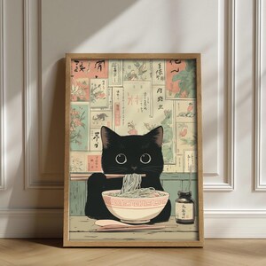 Whimsical black cat wall art for nursery — cute and cozy design capturing playful ramen vibes in soft hues.