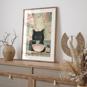 Adorable cat digital download for hall — charming artwork featuring a cat with chopsticks, perfect for a touch of Japanese culture.