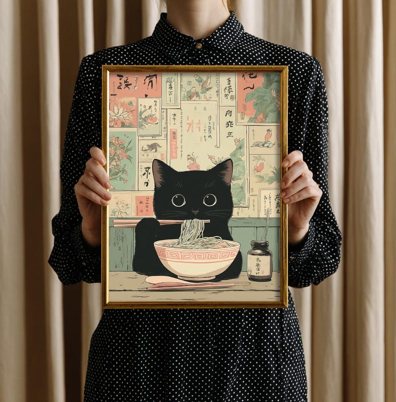 Cute cat wall art for living room — charming illustration of a black cat enjoying ramen, perfect for a cozy atmosphere.