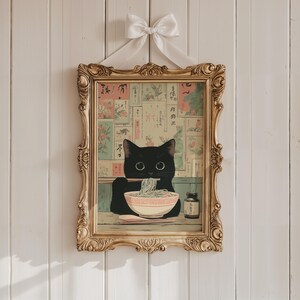Charming cat poster for dining area — cozy black cat with chopsticks creates a warm, Japanese-inspired atmosphere.