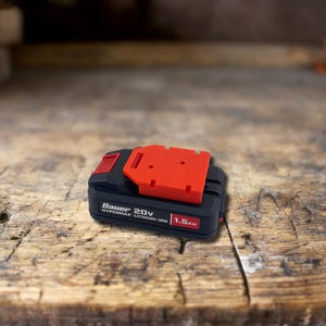 May include: A set of three ceramic mugs with a speckled, matte finish. The mugs are in shades of cream, light gray, and dark gray. Each mug has a simple, minimalist design and a rounded handle. The mugs are likely for coffee or tea.