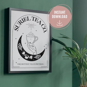 May include: Black and white illustration of a hand holding a cup of tea with a crescent moon and stars in the background. The text "Suriel Tea Co." is written in a circle around the image. The text "The Hottest Tea in Prythian" is written below the image.
