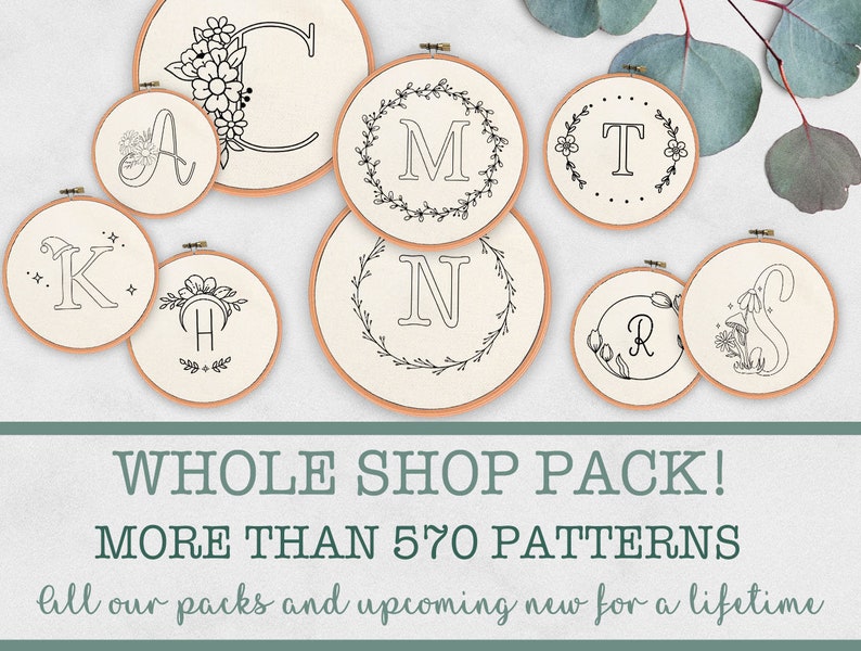 May include: A collection of embroidery hoop patterns featuring various letters of the alphabet, including A, C, H, K, M, N, R, S, and T. The text "WHOLE SHOP PACK! MORE THAN 570 PATTERNS" is displayed below the hoops. The text "bill our packs and upcoming new for a lifetime" is displayed below the text.
