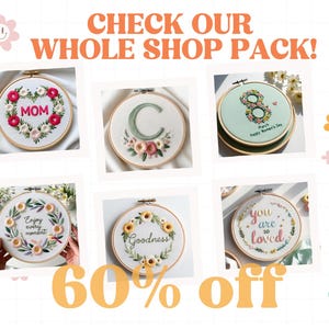 May include: Six embroidered hoop art pieces with floral designs and various text, including "MOM", "C", "8 March Happy Women's Day", "Enjoy every moment", "Goodness", and "You are so loved". The text is in a variety of colours and fonts. The hoops are all white with a wooden frame. The image is set against a white background with a grid pattern.