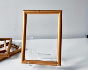 Vintage goudkleurige houten fotolijst op canvas