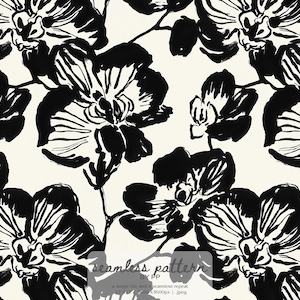 May include: A seamless pattern featuring large, stylized black orchid blossoms on a cream background. The flowers have detailed brushstrokes, creating a bold, artistic design. The text "seamless pattern" is visible at the bottom.