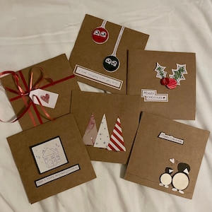 Cartões de felicitações de Natal feitos à mão e personalizáveis