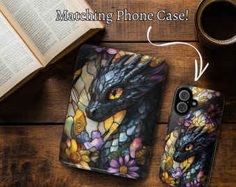 May include: A phone case and tablet case with a dragon design. The dragon has yellow eyes and is surrounded by colorful flowers. The cases are on a wooden surface with the text "Matching Phone Case!"