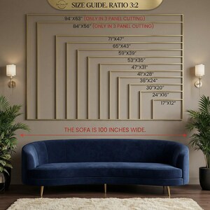 May include: A navy blue sofa with gold legs is positioned below a wall display of rectangular frames in varying sizes. The frames are arranged in a descending order, with dimensions listed in inches. Text at the top reads "SIZE GUIDE. RATIO 3:2". The sofa is 100 inches wide.