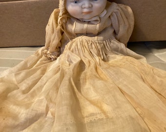 Vintage Unmarked  Porcelain-Cloth Baby Doll Painted Features 9"