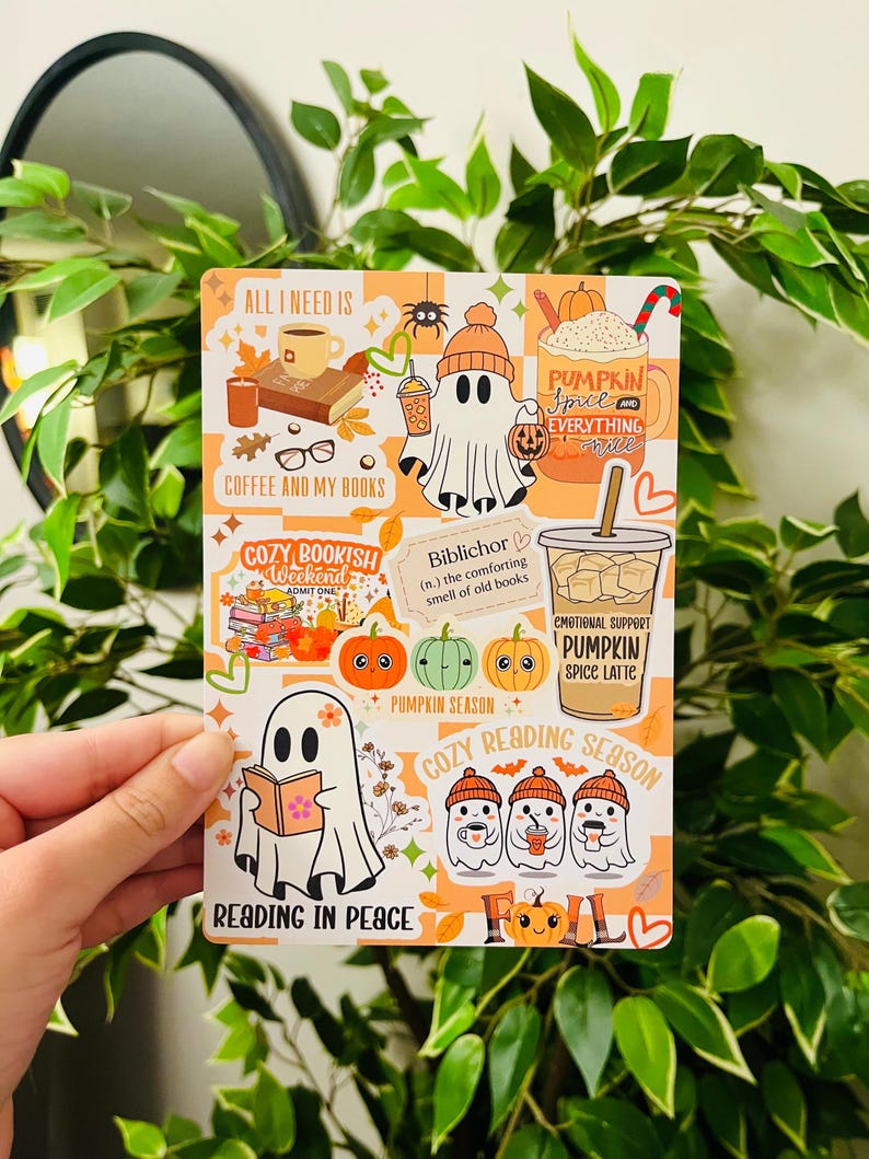 May include: A rectangular sticker with an orange and white checkered background. The sticker features illustrations of ghosts, pumpkins, coffee, books, and the text "ALL I NEED IS", "COFFEE AND MY BOOKS", "COZY BOOKISH WEEKEND", "PUMPKIN SEASON", "COZY READING SEASON", and "READING IN PEACE".