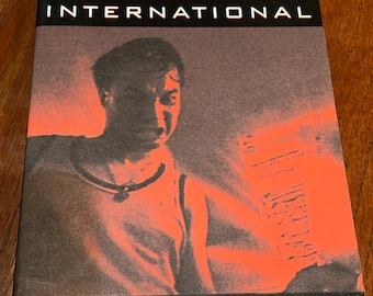 May include: A book titled "Horror International" with a red and black cover featuring a man's face. The book is edited by Steven Jay Schneider and Tony Williams.