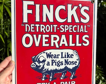Vintage Finck's Overalls "Wear Like a Pigs Nose" Metal Wall Sign