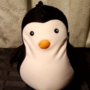 Kikkerland Zip Flip Travel Pillow, Penguin