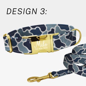 May include: A dog collar and leash set with a blue camouflage pattern. The collar features a gold-colored buckle engraved with the name "Milo" and a phone number. The text "DESIGN 3:" is at the top.