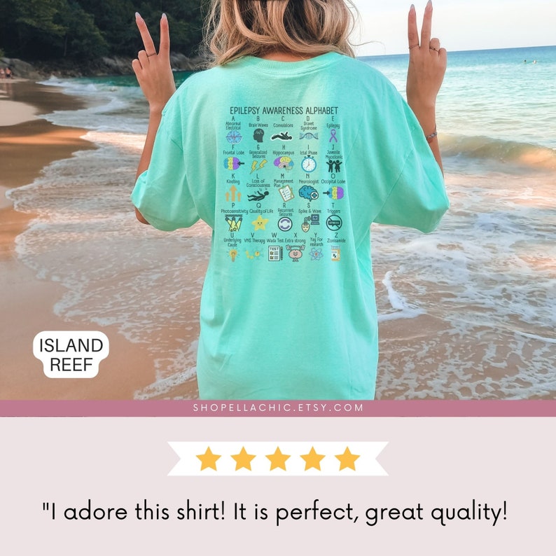 epilepsy awareness shirt with awareness alphabet A-Z. Purple ribbon month t-shirt on ivory comfort colors tee oversized on color island reef