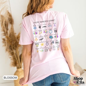 epilepsy awareness shirt with awareness alphabet A-Z. Purple ribbon month t-shirt on ivory comfort colors tee oversized on color blossom