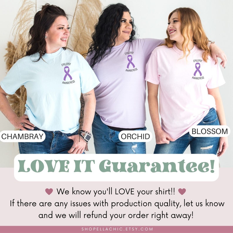 May include: Three women wearing different colored t-shirts with a purple ribbon and the text "Epilepsy Awareness". The t-shirts are in the colors Chambray, Orchid, and Blossom.