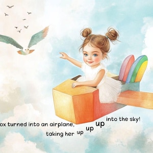 Puede incluir: Una ni&ntilde;a peque&ntilde;a est&aacute; sentada en una caja de cart&oacute;n que se ha transformado en un avi&oacute;n. La caja est&aacute; decorada con alas de arco&iacute;ris y las palabras "up up into the sky!" est&aacute;n escritas en el lateral. La ni&ntilde;a lleva un vestido blanco y tiene el pelo recogido en dos coletas.