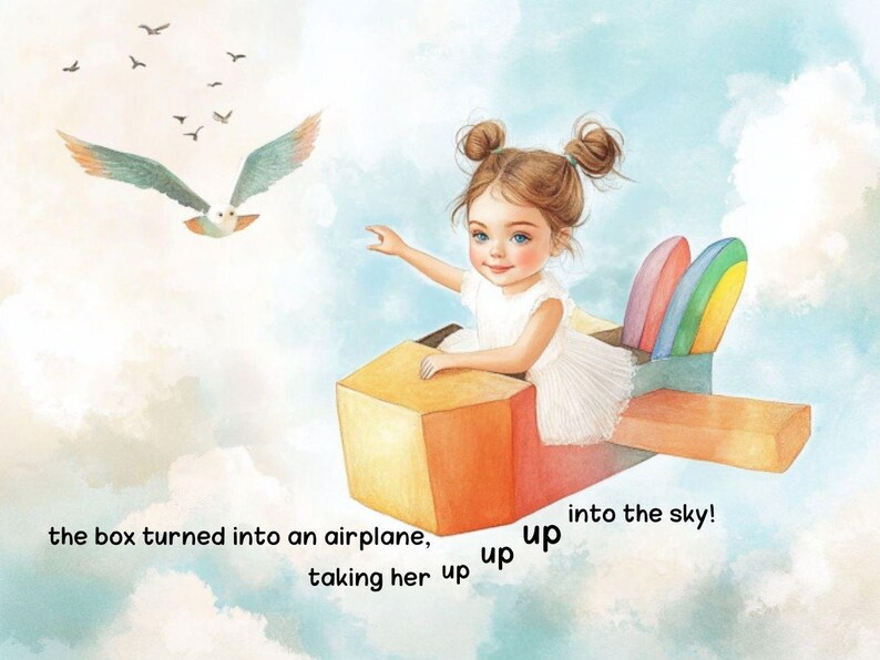 Puede incluir: Una ni&ntilde;a peque&ntilde;a est&aacute; sentada en una caja de cart&oacute;n que se ha transformado en un avi&oacute;n. La caja est&aacute; decorada con alas de arco&iacute;ris y las palabras "up up into the sky!" est&aacute;n escritas en el lateral. La ni&ntilde;a lleva un vestido blanco y tiene el pelo recogido en dos coletas.