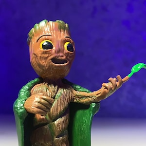 Baby Groot in a royal cape (MilkyClay)