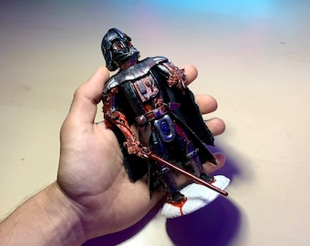 Darth Vader figure on a snowy platform (fan art by MilkyClay)