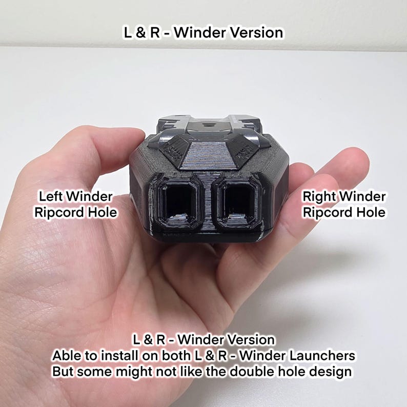 May include: A black, rectangular device with two square holes, labeled "Left Winder Ripcord Hole" and "Right Winder Ripcord Hole." The text "L & R - Winder Version" is above and below the device. The text says it can be installed on both L & R - Winder Launchers.