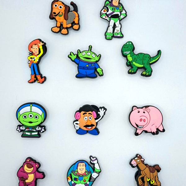 Toy story croc charms / Toy story / woody / buzzlight year / slinky / Rex / Ham / Mr potato head / Lots- o / bullseye