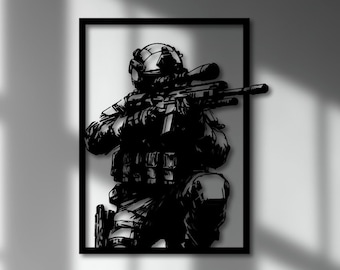 Puede incluir: Silueta en blanco y negro de un soldado sosteniendo un rifle, enmarcado en un marco negro y colgado en una pared blanca sobre una mesa consola negra.