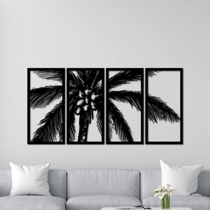 Puede incluir: Arte de pared en silueta en blanco y negro con una palmera con cocos. El arte está dividido en cuatro paneles rectangulares.