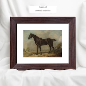 May include: A framed print featuring a dark brown horse in a landscape setting. The artwork is set within a brown frame with a white mat. The text "GHWALLART BROWN FRAME WITH WHITE MAT" is visible at the top.
