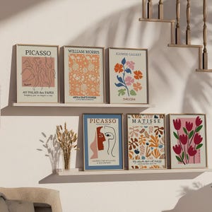 May include: Five framed art prints with colorful abstract designs. The prints feature the names "Picasso", "William Morris", "Flower Gallery", "Picasso", and "Matisse".