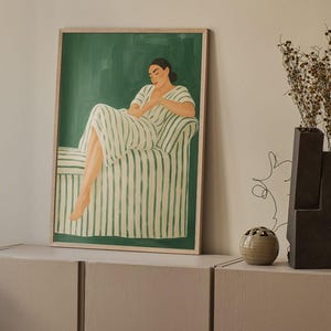 Framed modern woman art print, relaxing figure painting, minimalist green striped aesthetic wall decor, cozy lounge illustration