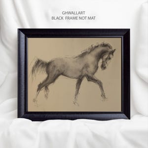 May include: Black framed artwork featuring a charcoal sketch of a horse in motion. The horse is depicted in shades of gray against a tan background. The text "GHWALLART BLACK FRAME NOT MAT" is printed at the top of the frame.