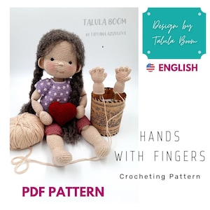 以下が含まれることがあります： 指で人形の手を作るための編み物のパターン。パターンは英語で、指で手を編むための指示が含まれています。パターンはPDFダウンロードとして入手できます。