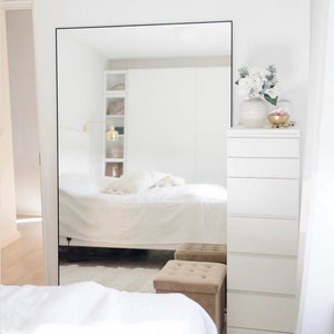 beautiful mirror with black frame