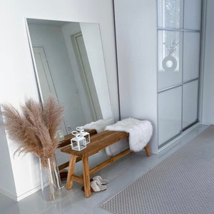 ovesize white frame mirror hallway