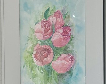 May include: Watercolor painting of pink roses with green leaves, set against a light blue and green background. The artwork is framed in a white rectangular frame, creating a classic and elegant aesthetic.