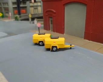 Lot de 2 remorques pour compresseurs d'air au 1/87 (échelle HO). Modèles personnalisés en résine imprimés en 3D.