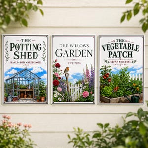 May include: Three rectangular metal signs with white backgrounds and black borders. The left sign reads THE POTTING SHED, the center sign reads THE WILLOWS GARDEN EST. 2026, and the right sign reads THE VEGETABLE PATCH GROWN WITH LOVE.