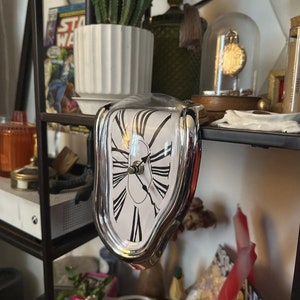 Artsy melting clock statement room decor piece | Salvador dali melting desk and shelf clock inspired by his painting