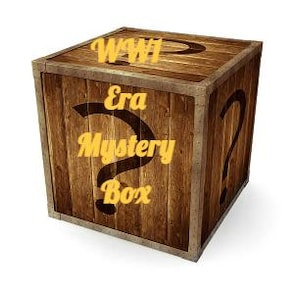 May include: A wooden box with a brown stain and a gold inscription that reads "WWII Era Mystery Box".