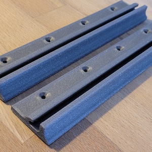 Rails for external table mounting for Grand California