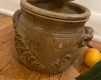 Pottery with lid. Made by Walsh