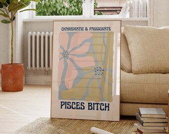 May include: A framed print with a floral design in shades of pink, yellow, and blue. The text "CHARISMATIC & PASSIONATE" is at the top and "PISCES BITCH" is at the bottom.