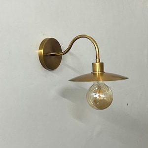 Luminous Elegance Handcrafted Brass Dish Wall Lamp Illuminating Home Decor