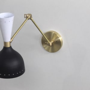 Illuminate Your Space with Our Handcrafted Brass Wall Sconce