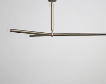 Mid Century Modern The Timeless Elegance of Brass Y Shaped Chandeliers