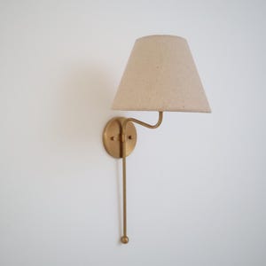 Artisanal Opulence Handcrafted Elegant Brass Wall Lamp Timeless Piece For Home Decor