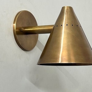 Elegant Brilliance Handcrafted Raw Brass Wall Lamp For Your Home image 4